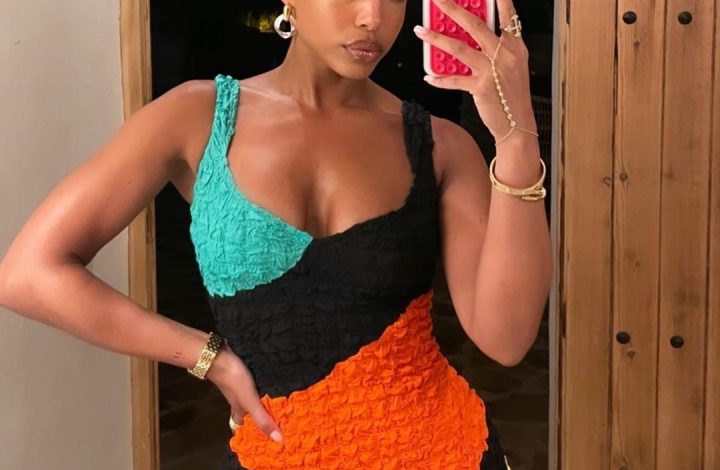 lori-harvey’s-multicolored-$895-mara-hoffman-textured-dress-and-yellow-loewe-heels-was-the-chicest-summer-ensemble