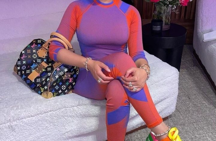 nicki-minaj-wore-a-red-and-purple-y-3-knit-set-with-$790-alexander-mcqueen-color-block-sneakers-and-a-louis-vuitton-murakami-handbag