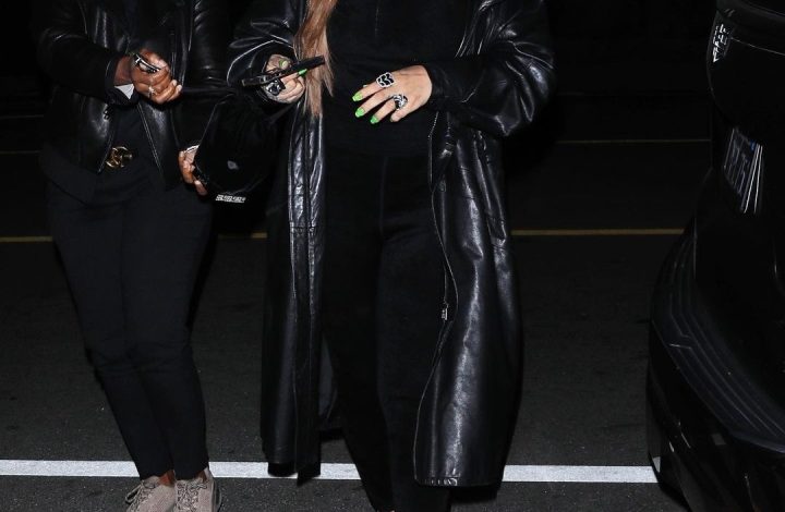 rihanna-slayed-the-scene-in-a-black-$25k-vintage-versace-leather-trench-with-$1,450-black-crystal-embellished-amina-muaddi-heels
